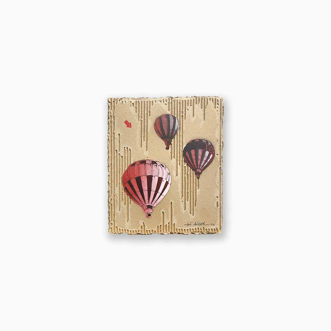 oeuvre de Jef Aérosol sur carton représentant 3 mongolfières rouges dans le ciel
